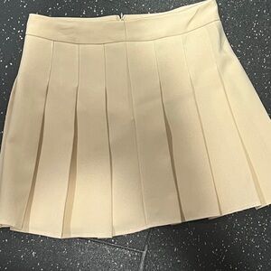 Women’s pleated Tan  skirt  size. Small